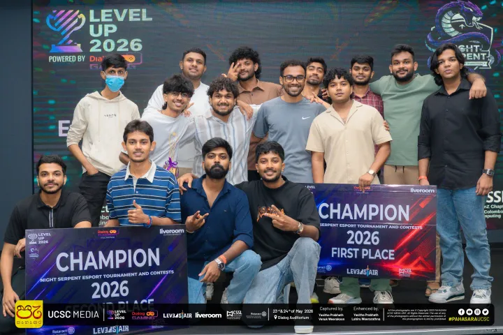 Night Serpent 2026 prize winners holding first- and second-place champion boards on stage at Level Up 2026